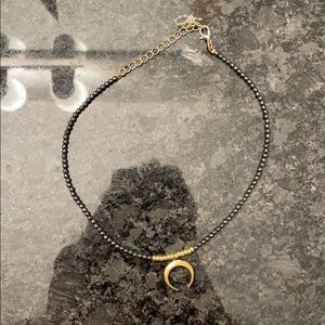 Half moon shaped necklace